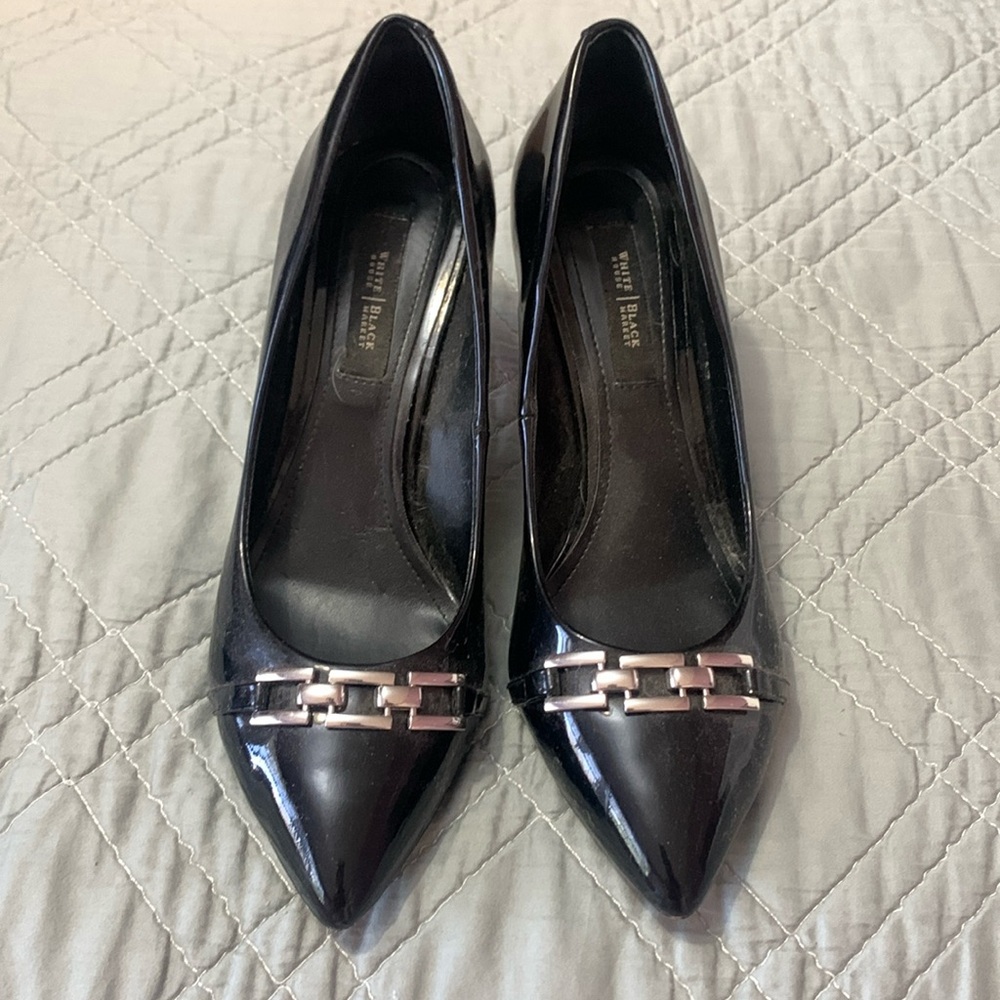 Great classic silver buckle pump worn three times, scraped bottom to not slip.